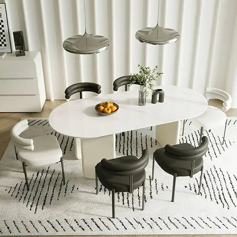 Table à manger ovale moderne couleur crème imitation marbre avec piètement unique à 3 pieds