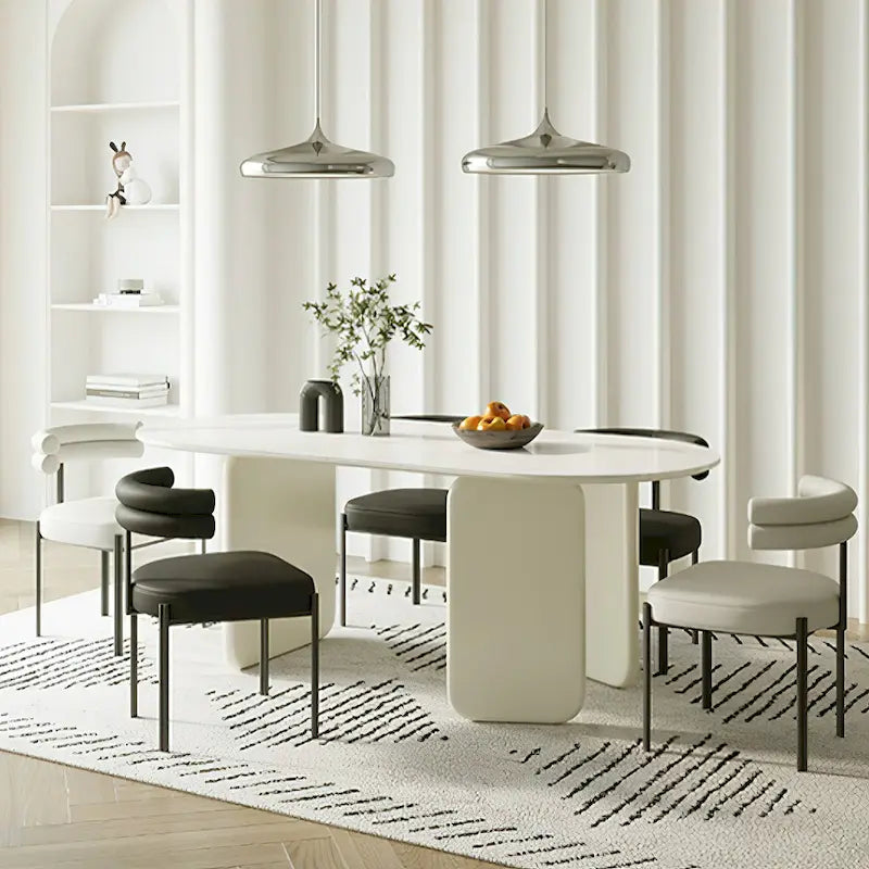Table à manger ovale moderne couleur crème imitation marbre avec piètement unique à 3 pieds