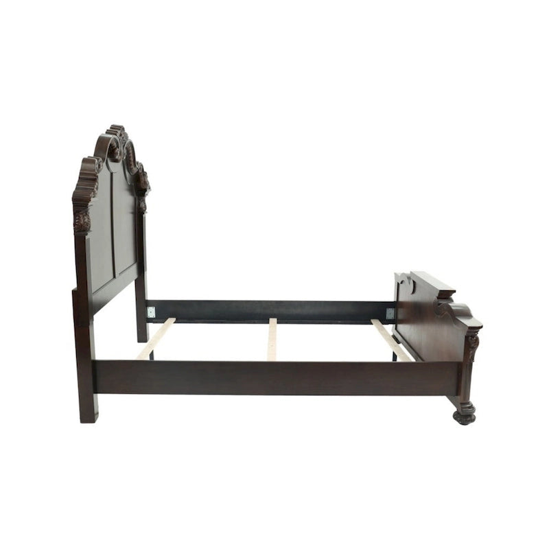 Lit queen en bois finement sculpté, finition noyer foncé et placage