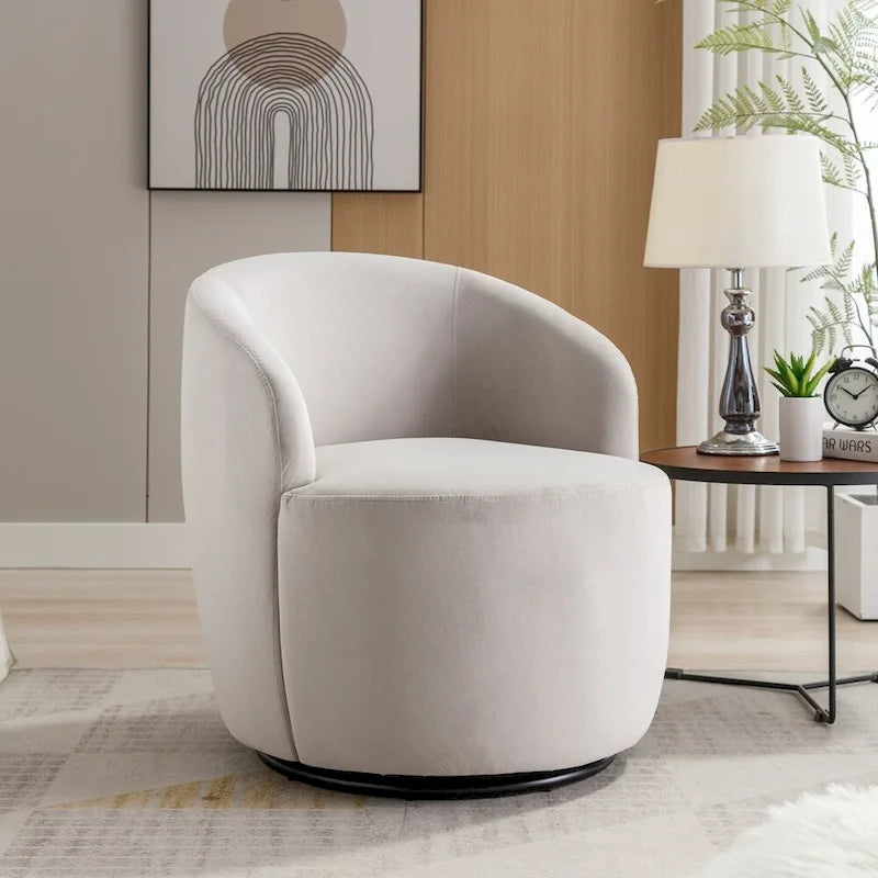 Fauteuil tonneau pivotant en tissu velours avec anneau métallique à revêtement en poudre noir